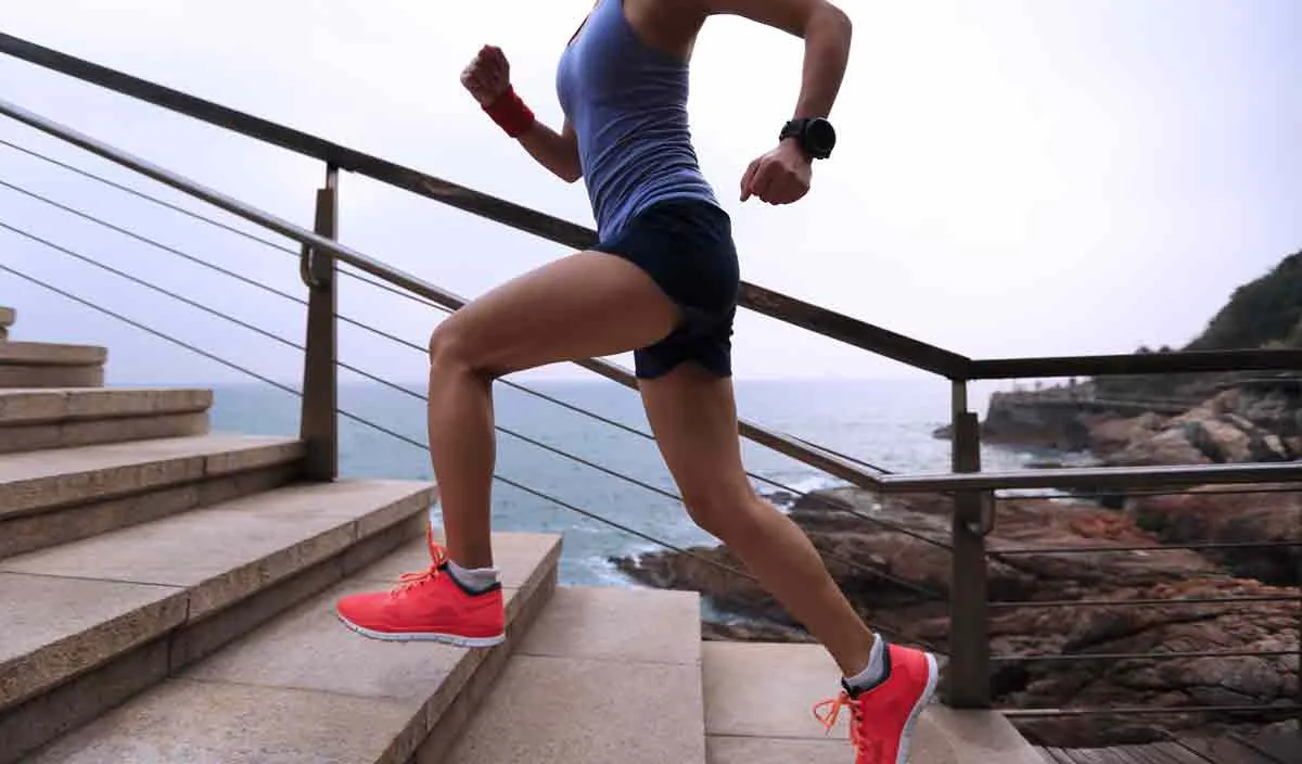 woman running up stairs